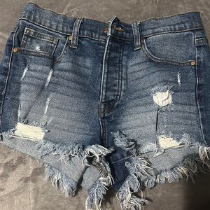 dark blue distressed jean shorts